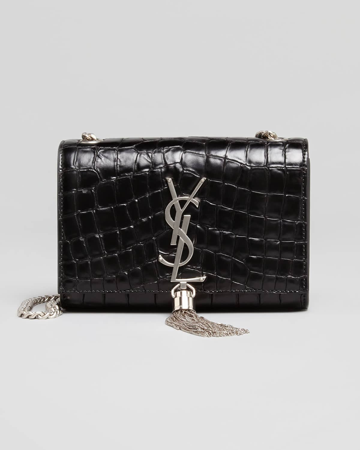 Saint-Laurent-YSL-Black-Croc-Embossed-Tassel-clutch-bag.jpg  