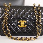 The Iconic Must Have Chanel Timeless Bag 23 cm with lined flap in black  quilted lambskin, ref.734989 - Joli Closet