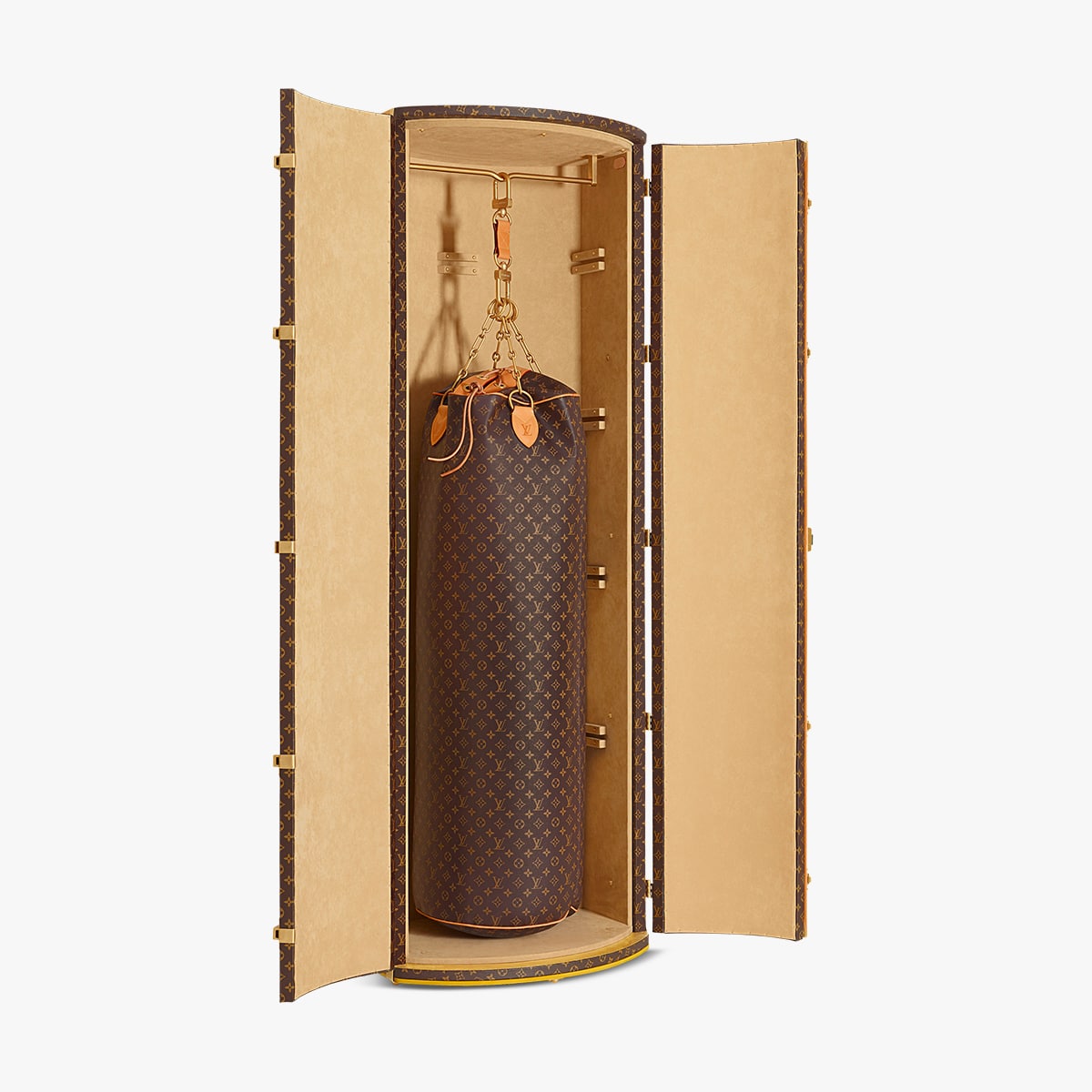 A SET OF TWO: LIMITED EDITION CELEBRATING MONOGRAM ICONOCLAST PUNCHING BAG  PM & CELEBRATING ICON & ICONOCLAST 160 YEARS MONOGRAM BOOK, LOUIS VUITTON,  2014