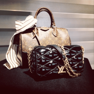 Louis Vuitton Monogram Canvas Speedy with Leather Corners : Black Malletage Twist Bag - Pre-Fall 2015