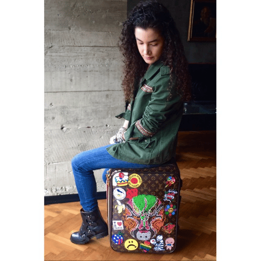 Anya Hindmarch Stickers on Louis Vuitton Pegase 55 Bag