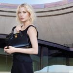 Michelle Williams with Louis Vuitton Steamer Trunk