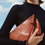 Celine Turtleneck Sweater and Brick Studded Small Sailor Bag