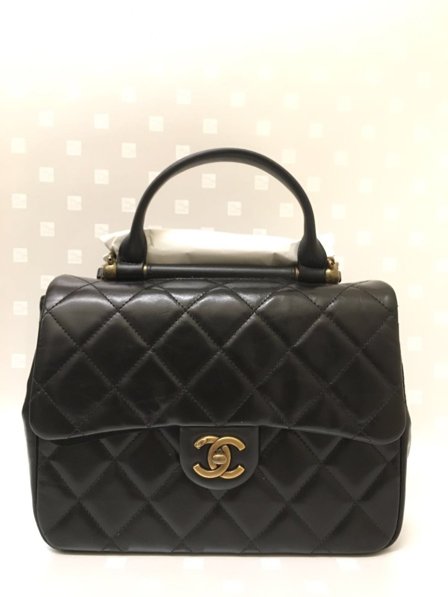 Chanel Gold Bar Top Handle Bag Reference Guide - Spotted Fashion