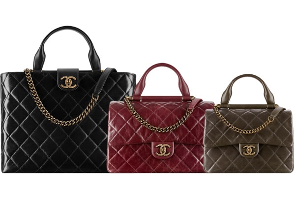 Chanel gold top bar bag