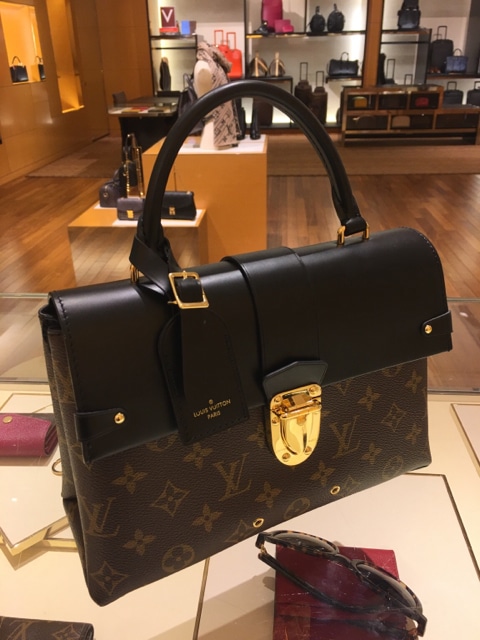 lv one handle flap bag