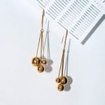 Celine Gold Brass Dot Triple Long Earrings