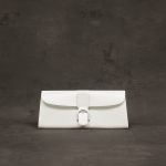 Delvaux Ivory Box Calf Pochette Brillant Bag