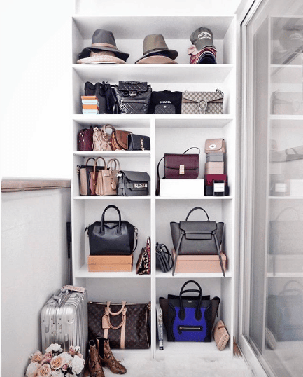 Designer handbag collection stored in IKEA Kallax: Louis Vuitton