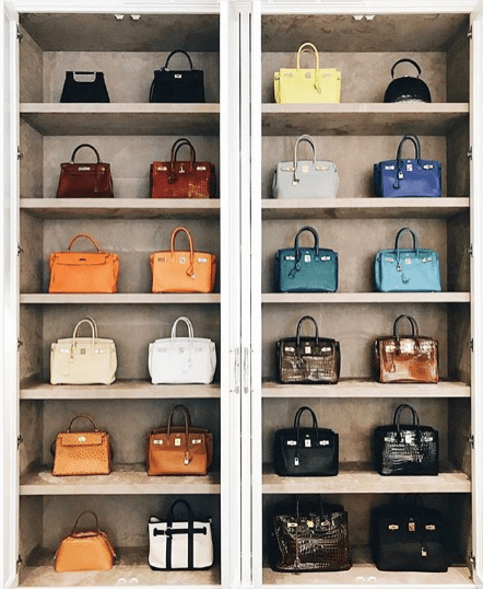 Designer handbag collection stored in IKEA Kallax: Louis Vuitton