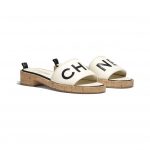 Chanel Ivory/Black Lambskin Mules