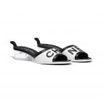 Chanel White/Black Lambskin Mules